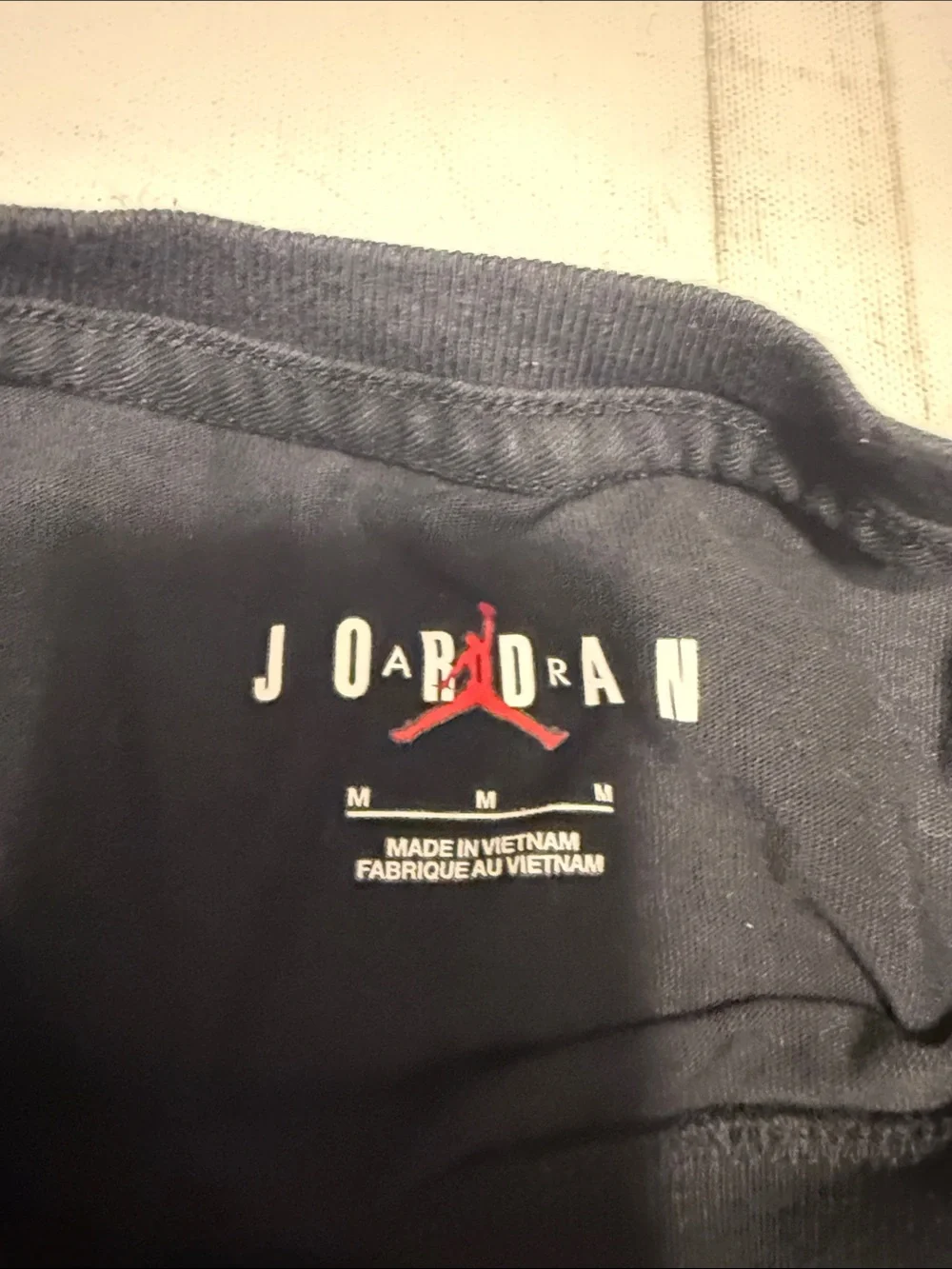 Jordan Short Sleeve Crew Tee in Black with Yellow Logo Graphics